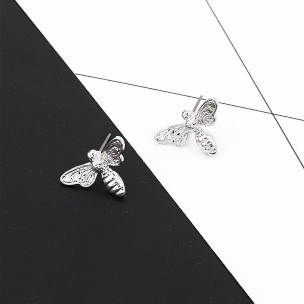 Silver tone dragonfly earrings